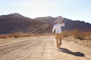 Homrich placing a cache in advance of of his trek.